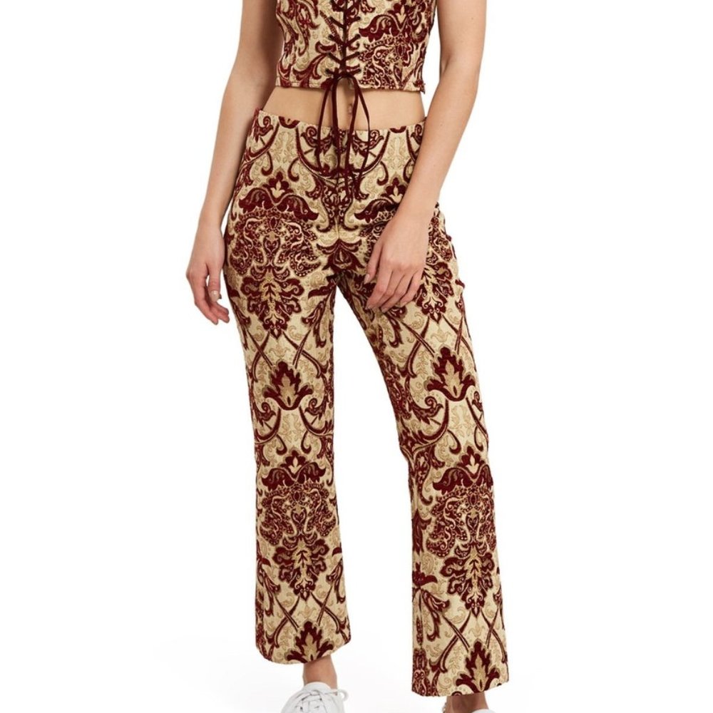 callipygian pants red brocade